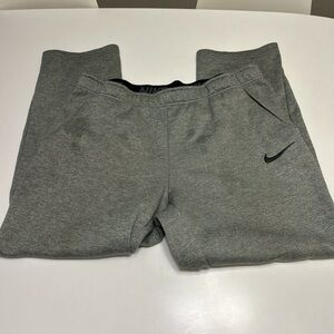 Men’s Grey Nike DRI-FIT sweatpants with black Nike swoosh and pockets size XL